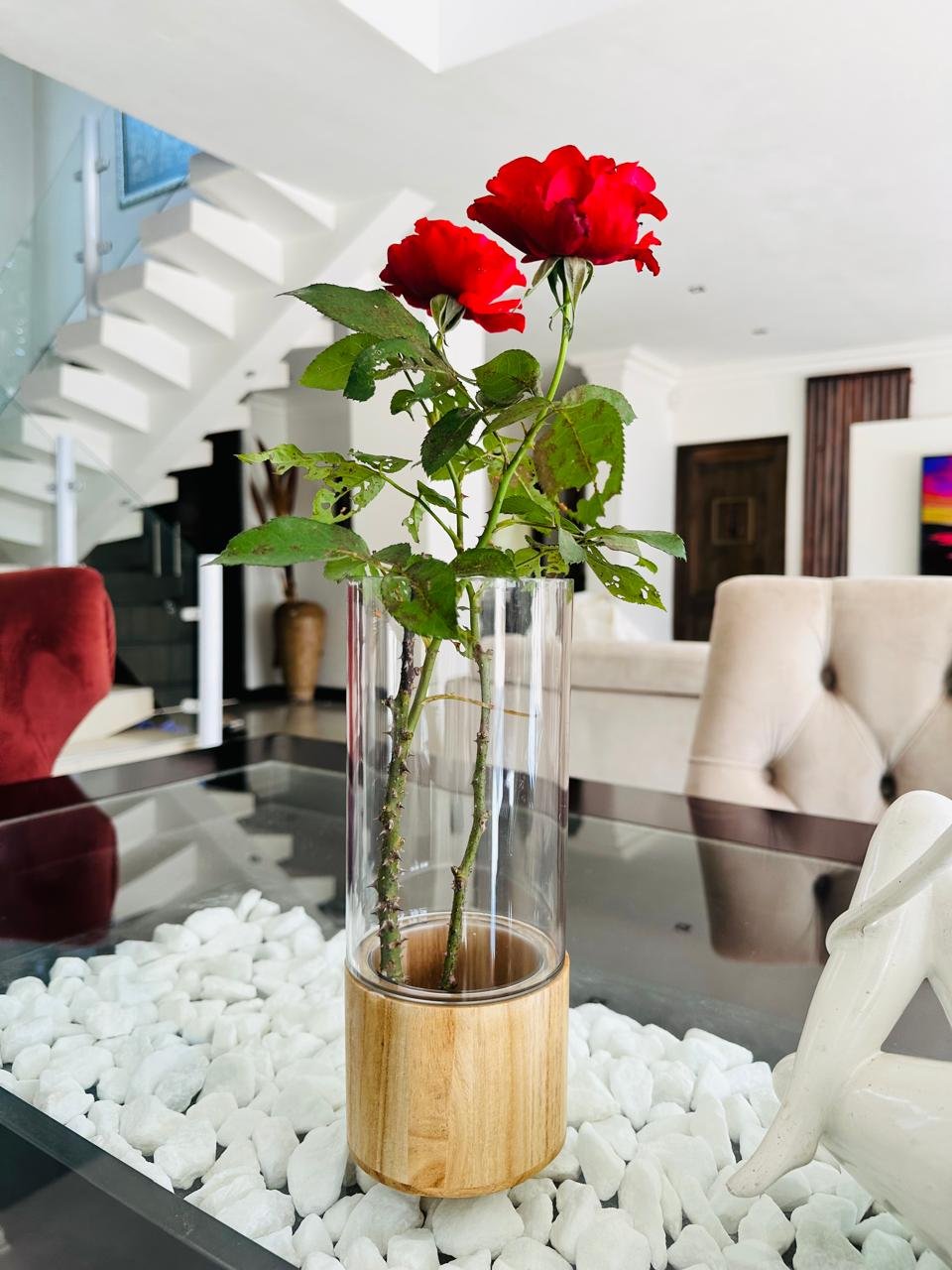 Acrylic vase_beige wood stand_dining table_stairs view