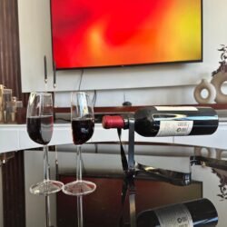 Half wine glasses_filled_black wine string_TV view