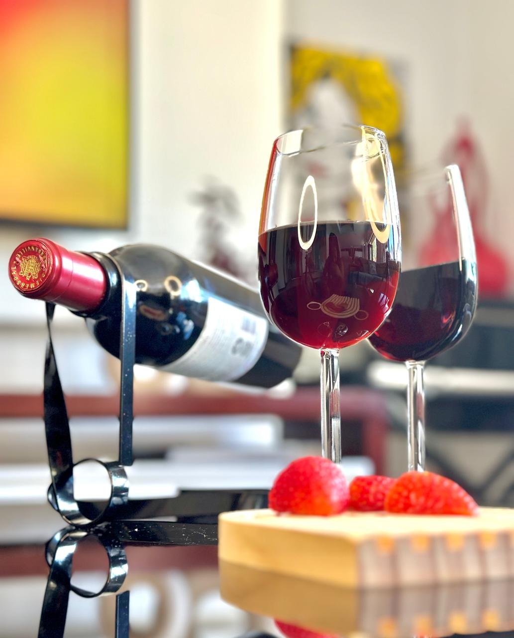 Half wine glasses_filled_black wine string_dining room table