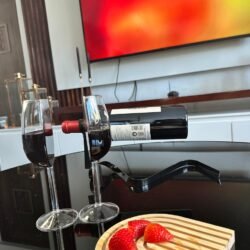 Half wine glasses_filled_coffee table_oval tray_TV view